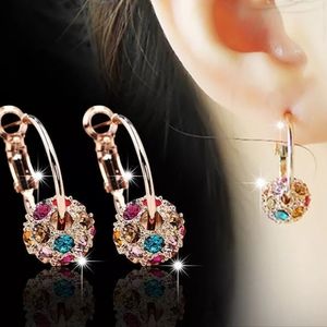 RINGS WITH GLASS DESIGN.  GOLDEN COLOUR.